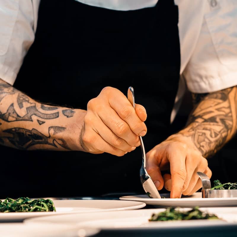 Photo of a chef preparing food